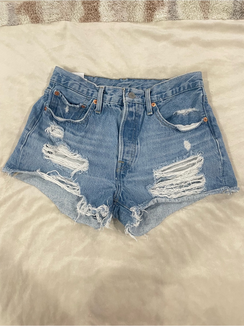 Levi's 501 Light Blue Distressed High-Rise Jean Shorts